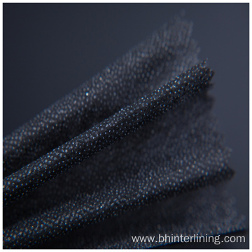 Shrink resistant double dot non woven fusible interlining